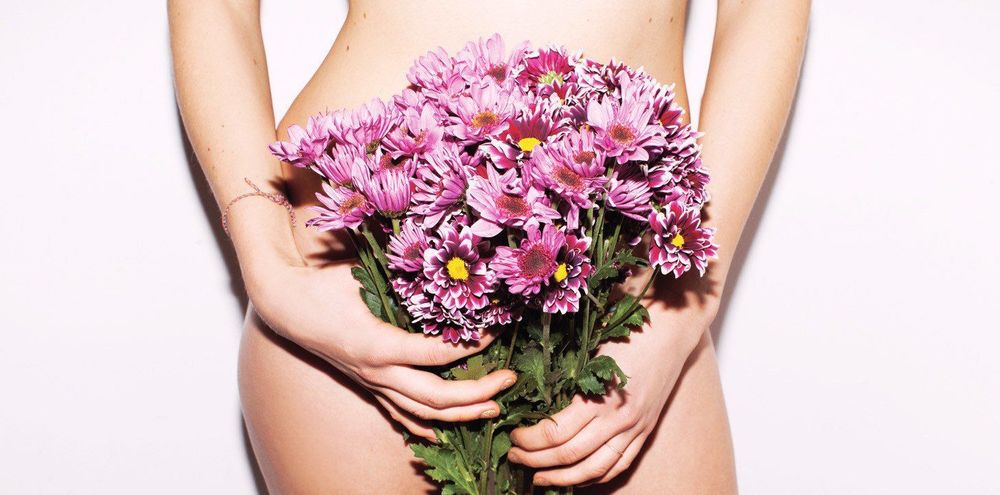 large_naked_woman_with_flowers_over_her_vagina.jpeg